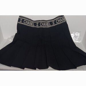 NEW BLACK PLEADED MINI SKIRT